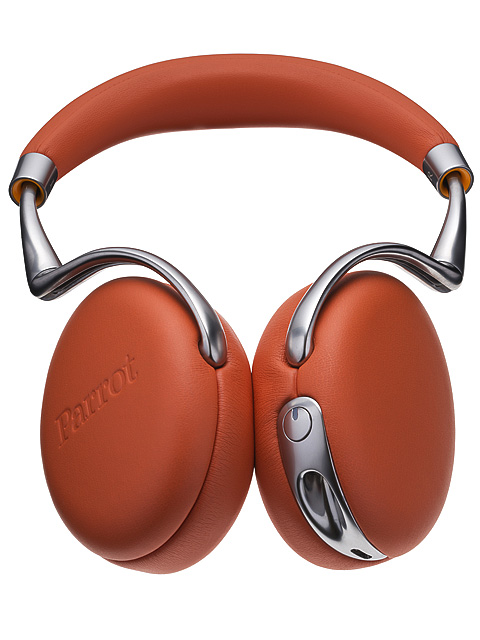 Parrot, pair of orange leather headphones, commercial product photography